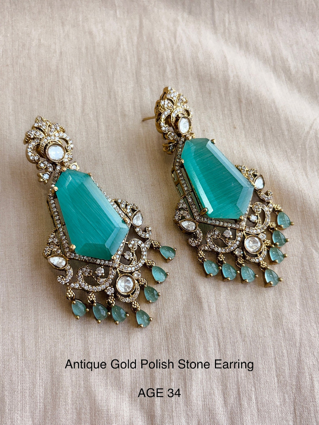 Ethno gold stone earring