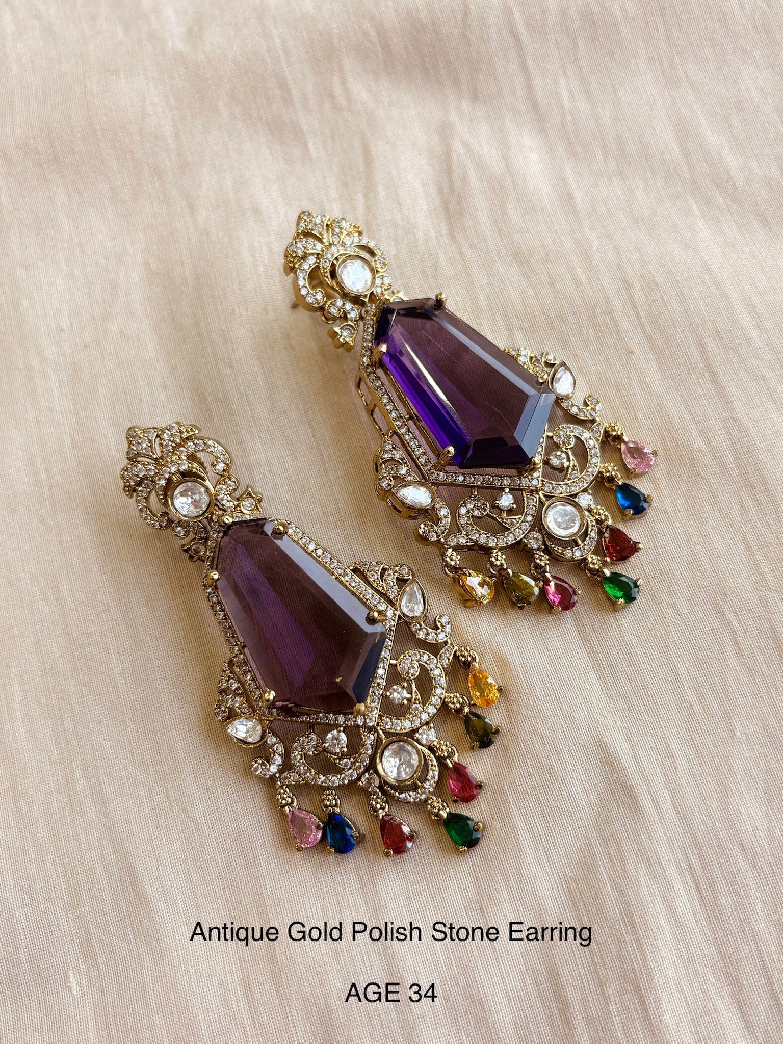 Ethno gold stone earring