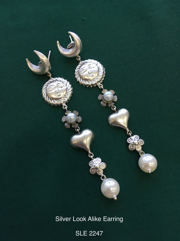 Antique silver tone earring