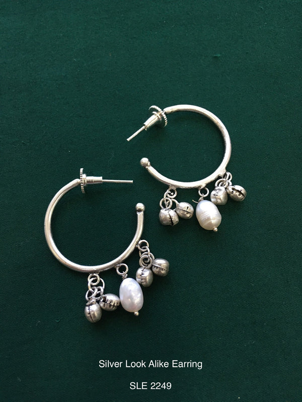 Antique silver tone earring
