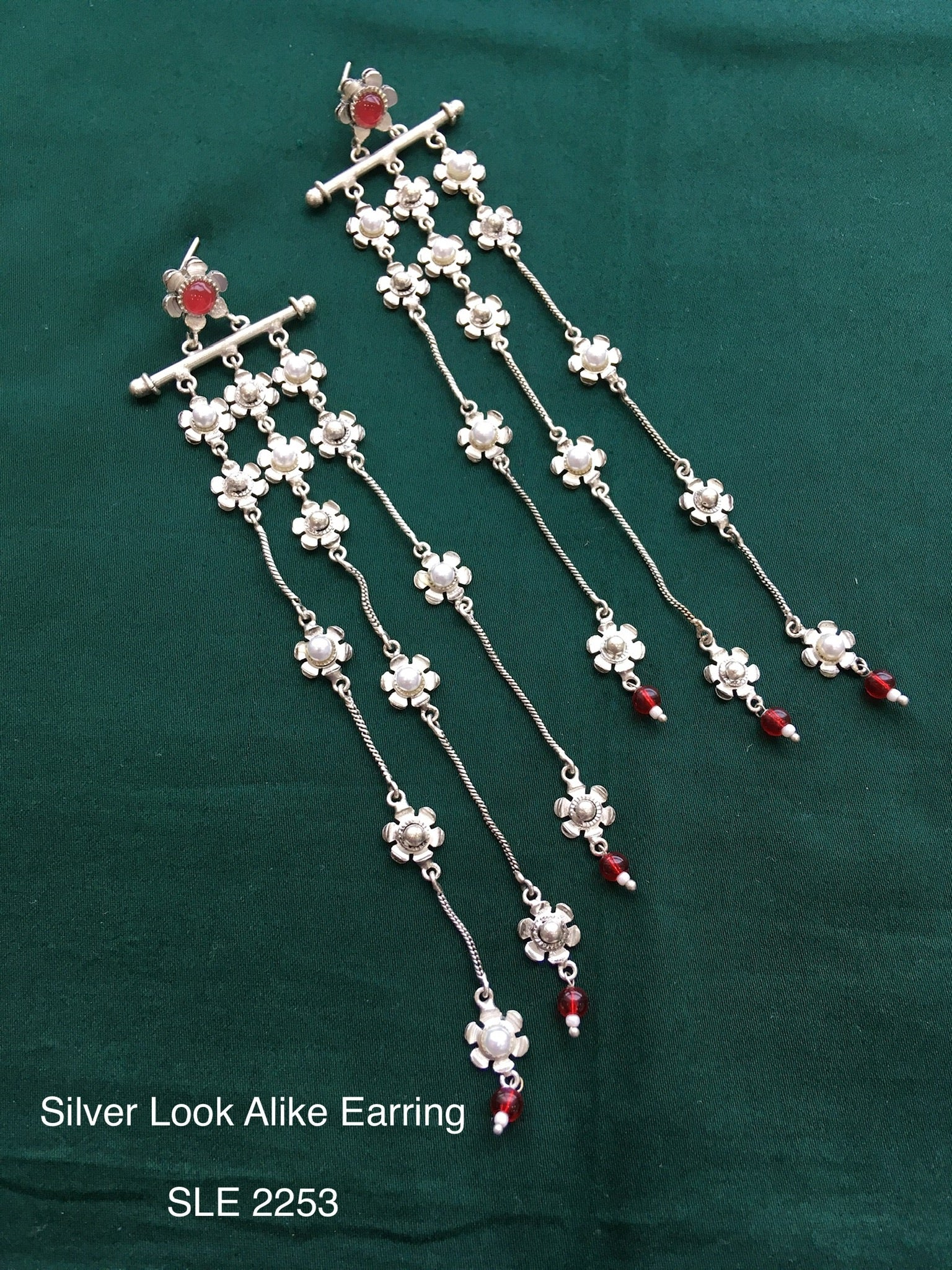 Antique silver tone earring