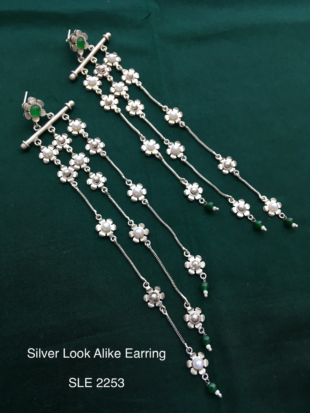 Antique silver tone earring