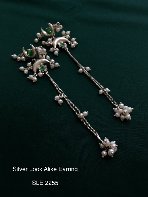 Antique silver tone long earring