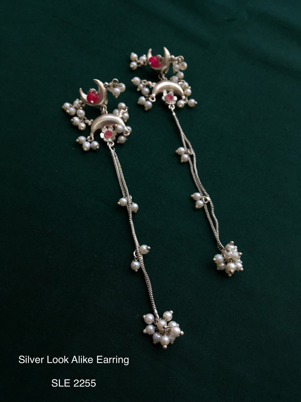 Antique silver tone long earring