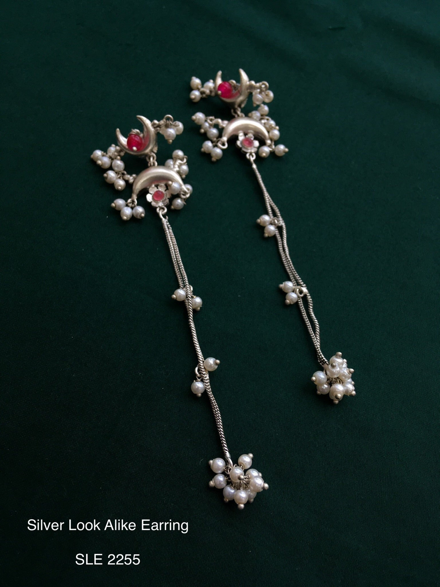 Antique silver tone long earring
